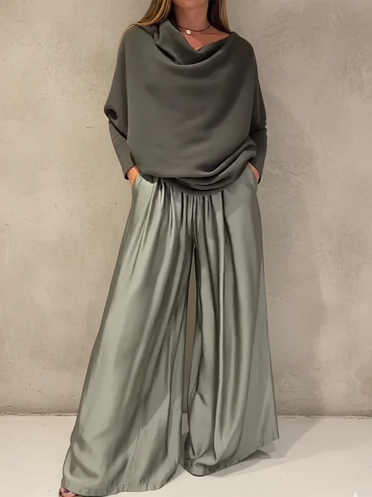 Gala – Elegant suit with off-the-shoulder design